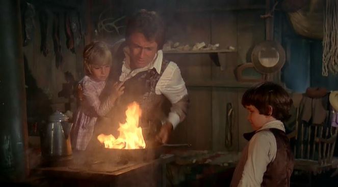 I wonder what child labor laws were like back in the days since the young girl is obviously as close to the fire as she can possibly be.