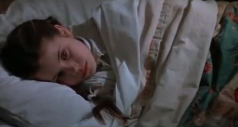 She seems to have gotten extremely younger than she was in "The Wizard of Oz". Maybe she traveled at the speed of light back to Kansas causing her to grow younger.