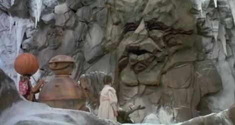 He appears as a face in the rocky mountain.