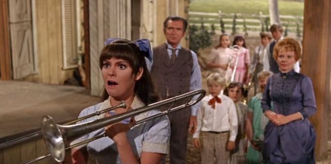 "Oh...my...umm...would you believe I was doing an impression of Little Boy Blue blowing his horn?"